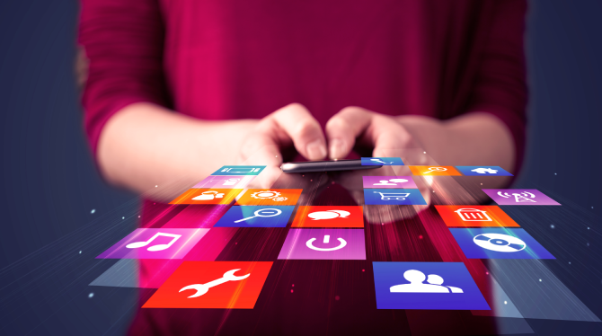 vecteezy_woman-holding-smart-phone-with-colorful-application-icons_50070465